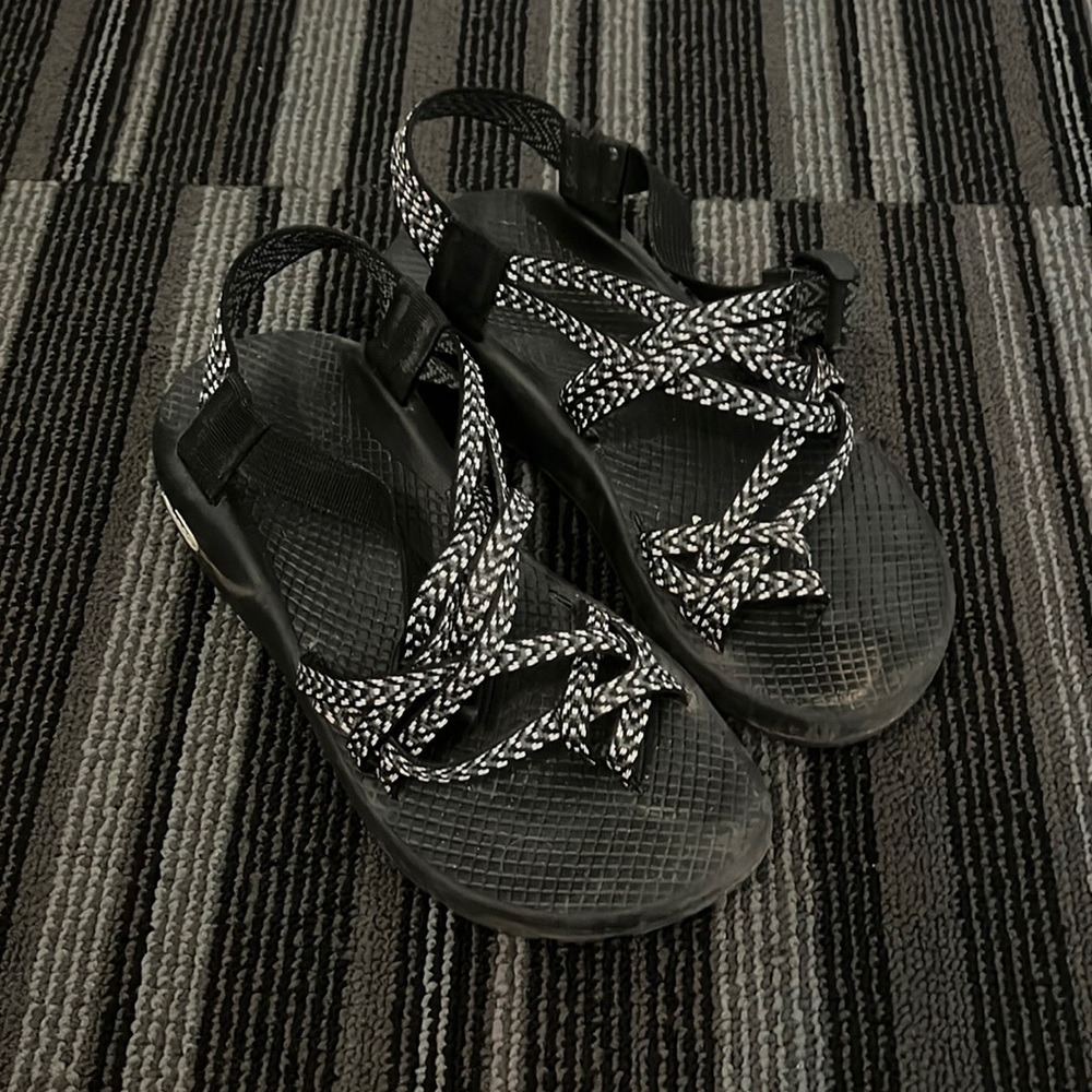 Black and white toe strap chacos